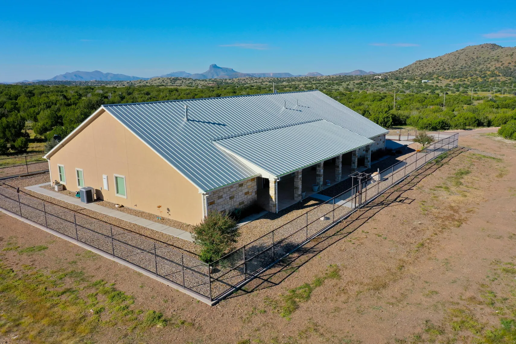 Aerial of the home looking west toward the mountains